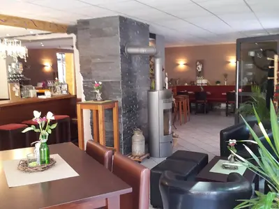 Ein Sitzbereich in der Unterkunft Weincafé Korkenzieher
