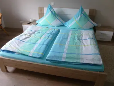 Ein Bett oder Betten in einem Zimmer der Unterkunft Pension Susanne