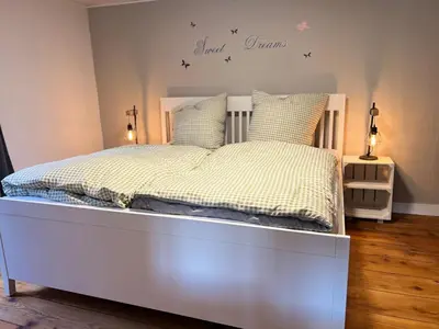 Ein Bett oder Betten in einem Zimmer der Unterkunft Moselblick im Denkmal