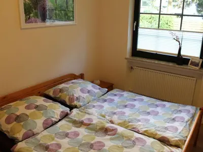 Ein Bett oder Betten in einem Zimmer der Unterkunft Ferienhaus Krämer