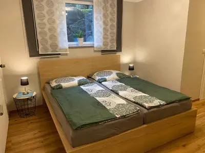 Ein Bett oder Betten in einem Zimmer der Unterkunft Ferienhaus Krämer
