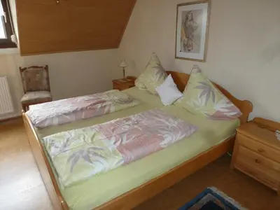Ein Bett oder Betten in einem Zimmer der Unterkunft Ferienwohnungen Eckstein