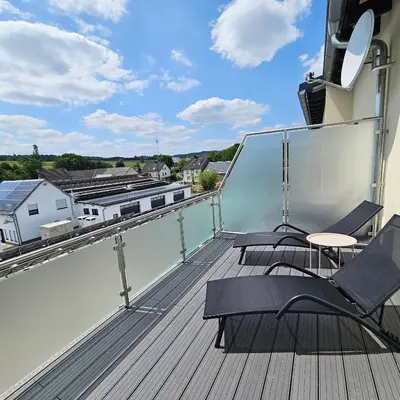 Ein Balkon oder eine Terrasse in der Unterkunft Pitlane Apartment 4