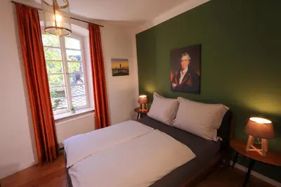 Ein Bett oder Betten in einem Zimmer der Unterkunft B&B Echternacher Hof
