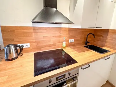 Küche/Küchenzeile in der Unterkunft Cozy 2-room apartment with WiFi & SKY