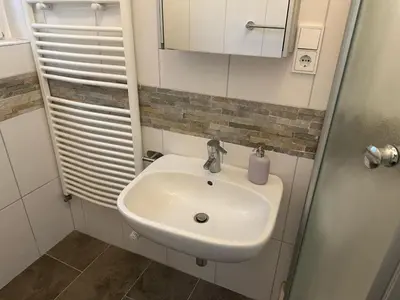 Ein Badezimmer in der Unterkunft Burg Panoramablick City Retreat Moderne FeWo