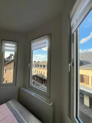 Ein Bett oder Betten in einem Zimmer der Unterkunft Ferienwohnung Andi