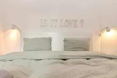Ein Bett oder Betten in einem Zimmer der Unterkunft Altstadt Residenz