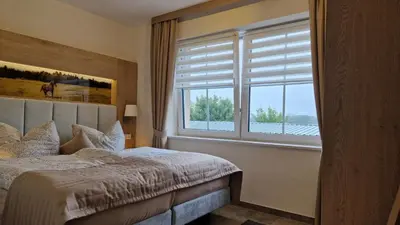 Ein Bett oder Betten in einem Zimmer der Unterkunft Rosenberghof