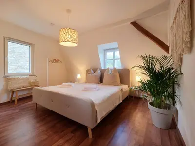 Ein Bett oder Betten in einem Zimmer der Unterkunft Cozy apartment near Mosel - top location - mountain view