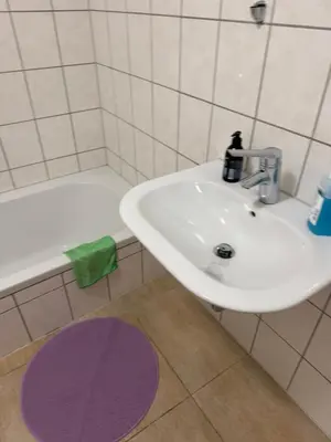 Ein Badezimmer in der Unterkunft WINNINGEN TOP Wohnung