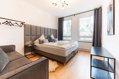 Ein Bett oder Betten in einem Zimmer der Unterkunft 3-Floor Oasis in the Heart of Koblenz, Sleeps 16
