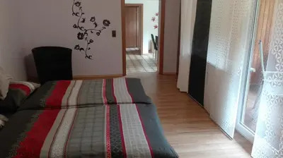 Ein Bett oder Betten in einem Zimmer der Unterkunft Ferienwohnung Zenzen