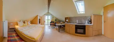 Ein Bett oder Betten in einem Zimmer der Unterkunft Ferienweingut Winnebeck