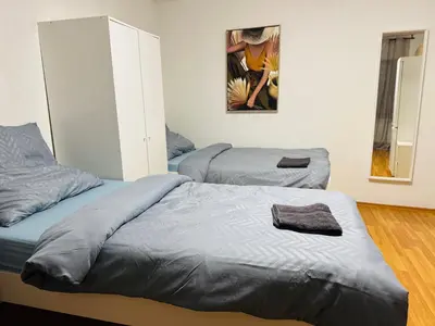 Ein Bett oder Betten in einem Zimmer der Unterkunft Unabhängiges Twin-Apartment