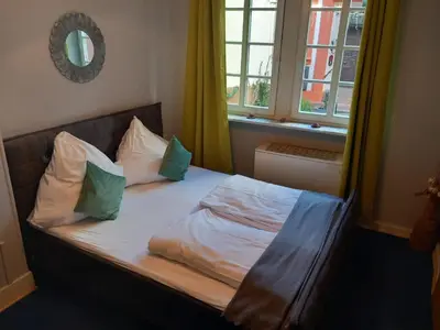 Ein Bett oder Betten in einem Zimmer der Unterkunft Altstadt Oase Bernkastel-kues