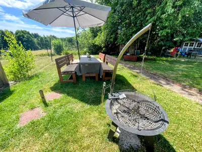 Ein Garten an der Unterkunft FeWo I Glücksmomente Bostalsee