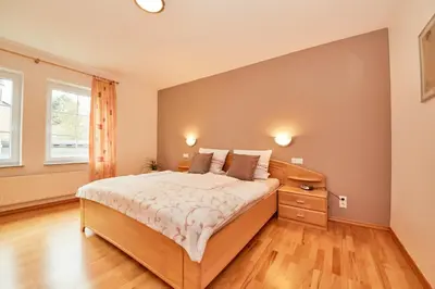Ein Bett oder Betten in einem Zimmer der Unterkunft WeinGut Hermes