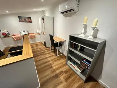 Ein Sitzbereich in der Unterkunft Ferienhaus mit umzäuntem Garten und Terrasse im schönen Nahetal