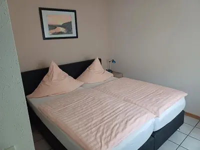 Ein Bett oder Betten in einem Zimmer der Unterkunft Kemmers Apartments