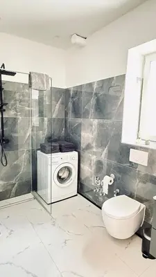 Ein Badezimmer in der Unterkunft Suite Fritz
