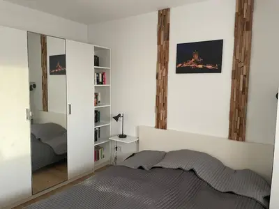 Ein Bett oder Betten in einem Zimmer der Unterkunft gemütliche Ferienwohnung
