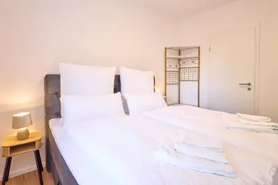 Ein Bett oder Betten in einem Zimmer der Unterkunft ZoHe Apartments Bernkastel-Kues