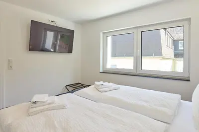 Ein Bett oder Betten in einem Zimmer der Unterkunft ZoHe Apartments Bernkastel-Kues