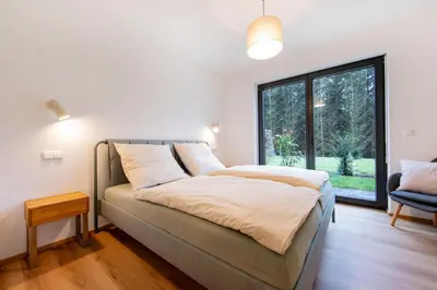 Ein Bett oder Betten in einem Zimmer der Unterkunft NATURNEST Eifel, Ferienwohnung