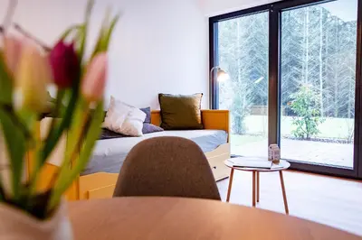 Ein Sitzbereich in der Unterkunft NATURNEST Eifel, Ferienwohnung