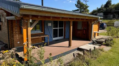 Ein Garten an der Unterkunft EifelChalet Niederehe