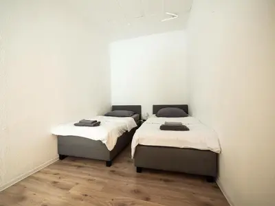 Ein Bett oder Betten in einem Zimmer der Unterkunft Zentrale Unterkunft Nähe Hbf