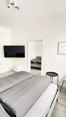 Ein Bett oder Betten in einem Zimmer der Unterkunft Suite Hilde