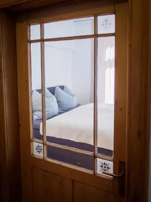 Ein Bett oder Betten in einem Zimmer der Unterkunft Ferienwohnung in Ehrenbreitstein
