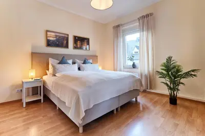 Ein Bett oder Betten in einem Zimmer der Unterkunft MARX - Stilvolles Studio-Apartment im Stadtzentrum - ideal für Paare & Geschäftsreisende, Gratis WLAN