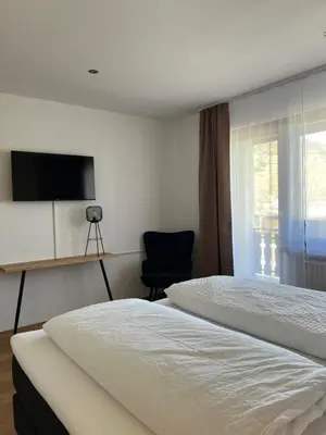 Ein Bett oder Betten in einem Zimmer der Unterkunft Weingut Lindenhof