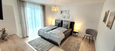 Ein Bett oder Betten in einem Zimmer der Unterkunft Ring Aurum