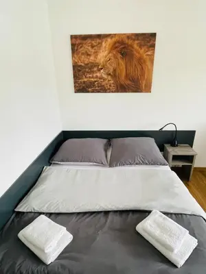 Ein Bett oder Betten in einem Zimmer der Unterkunft Apartment am Deutschen Eck