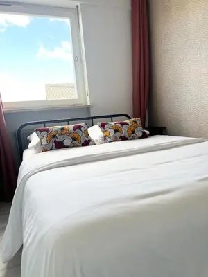 Ein Bett oder Betten in einem Zimmer der Unterkunft Gemütliches Studio in Korlingen