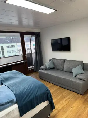 Ein Bett oder Betten in einem Zimmer der Unterkunft Rhine & Wine Apartment