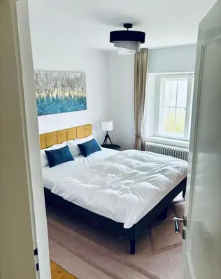 Ein Bett oder Betten in einem Zimmer der Unterkunft Maison Manderscheid, Vulkaneifel