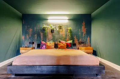 Ein Bett oder Betten in einem Zimmer der Unterkunft Bahnhofsromantik trifft Luxus - Alter Bahnhof von Kruft