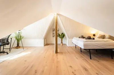 Ein Bett oder Betten in einem Zimmer der Unterkunft Denkmal Rhens