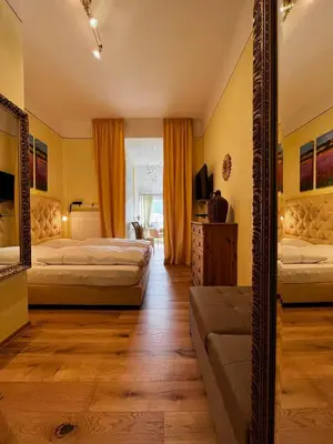 Ein Bett oder Betten in einem Zimmer der Unterkunft Provence am Kurpark