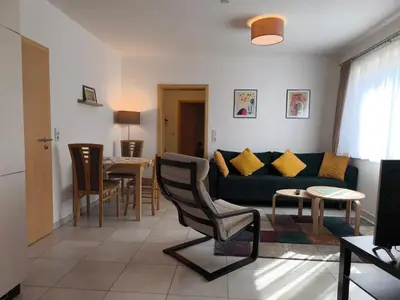 Ein Sitzbereich in der Unterkunft Ferienwohnung Ries am Weinberg