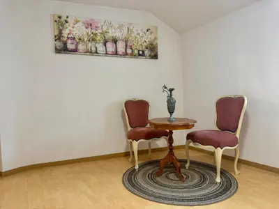 Ein Sitzbereich in der Unterkunft Team Haus für 11 Personen