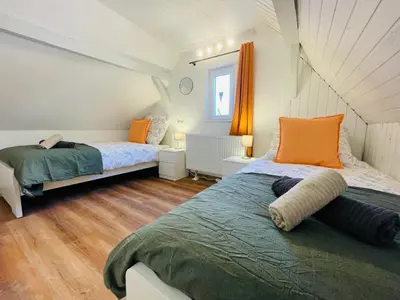 Ein Bett oder Betten in einem Zimmer der Unterkunft Ferienhaus Müdenzauber