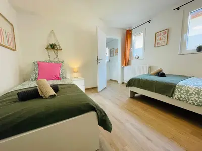 Ein Bett oder Betten in einem Zimmer der Unterkunft Ferienhaus Müdenzauber