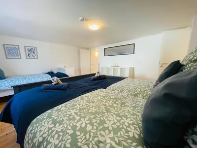 Ein Bett oder Betten in einem Zimmer der Unterkunft Ferienhaus Müdenzauber