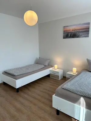 Ein Bett oder Betten in einem Zimmer der Unterkunft Helenes Ferienwohnung